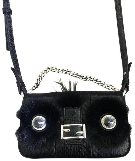 fendi monster two tone|Fendi monster resale.